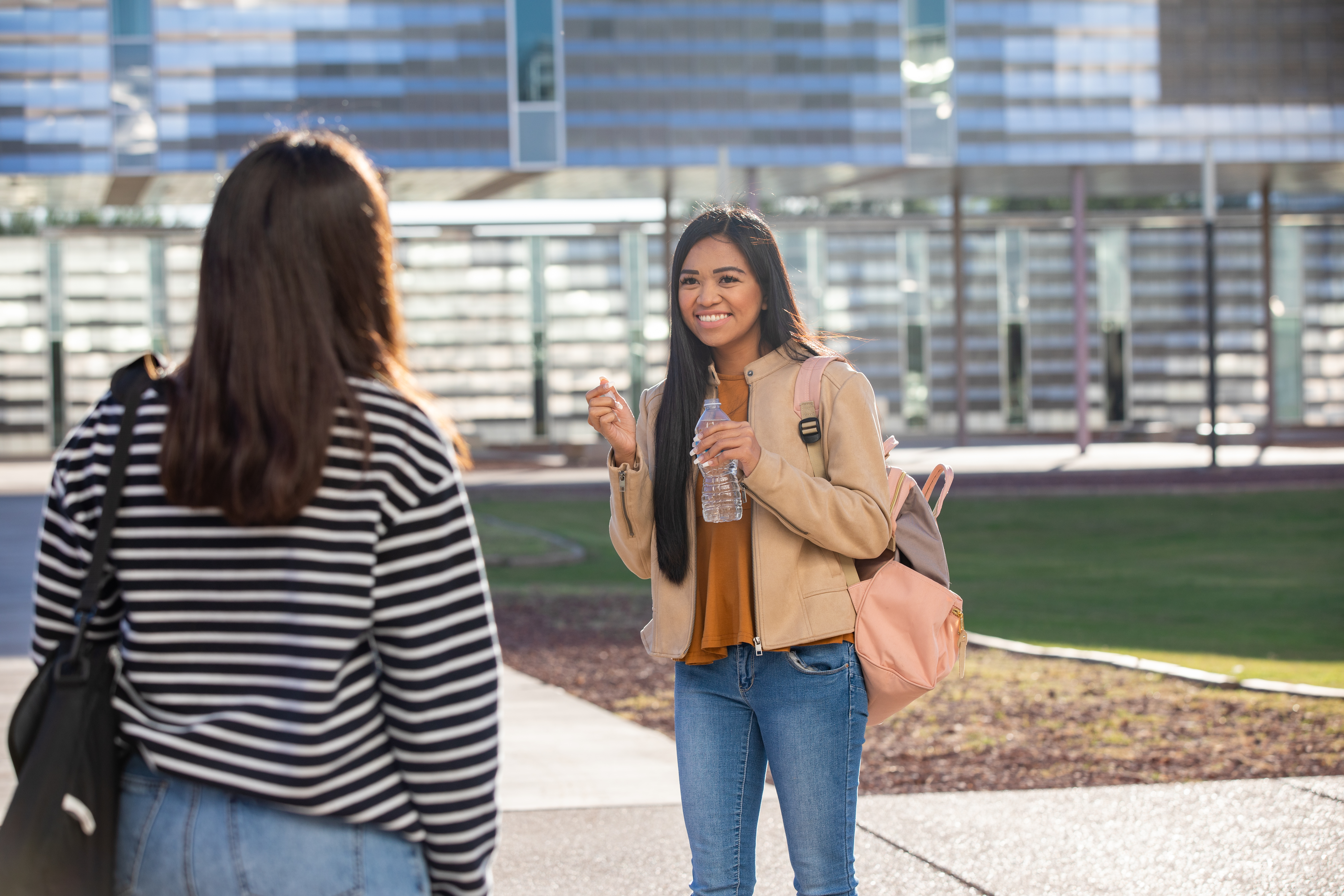 Student speaking outdoors.
