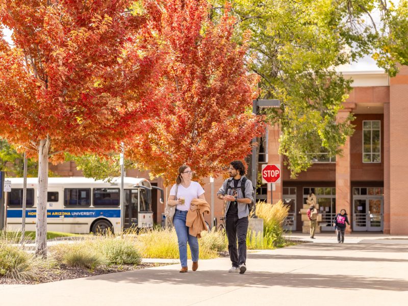 Students walking across campus.