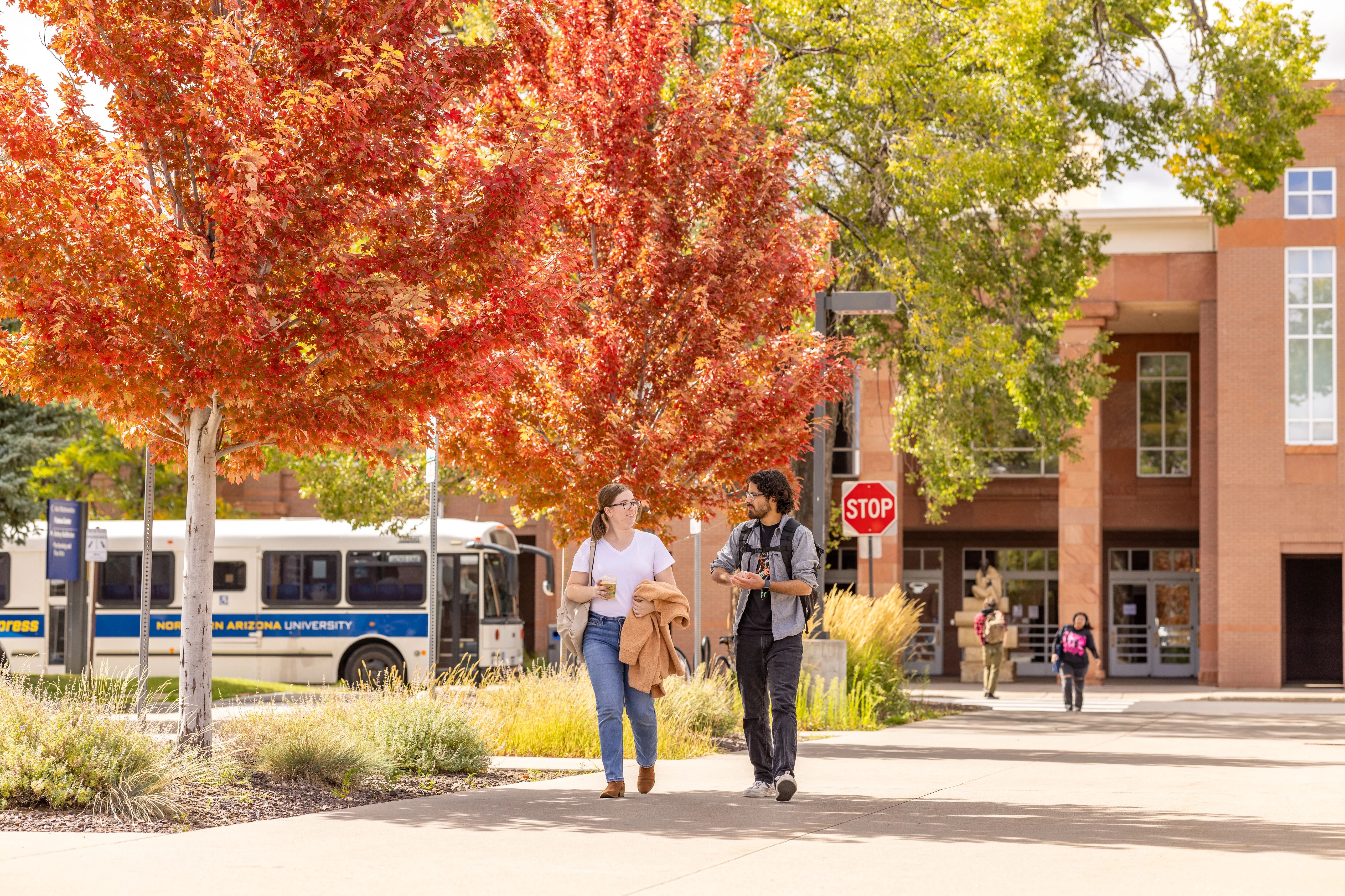 Students walking across campus.