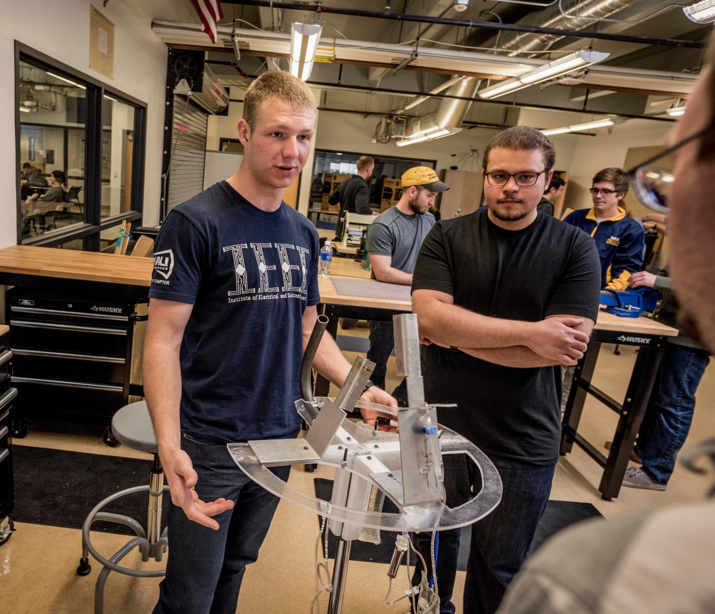 Engineering students working on a project together in class.