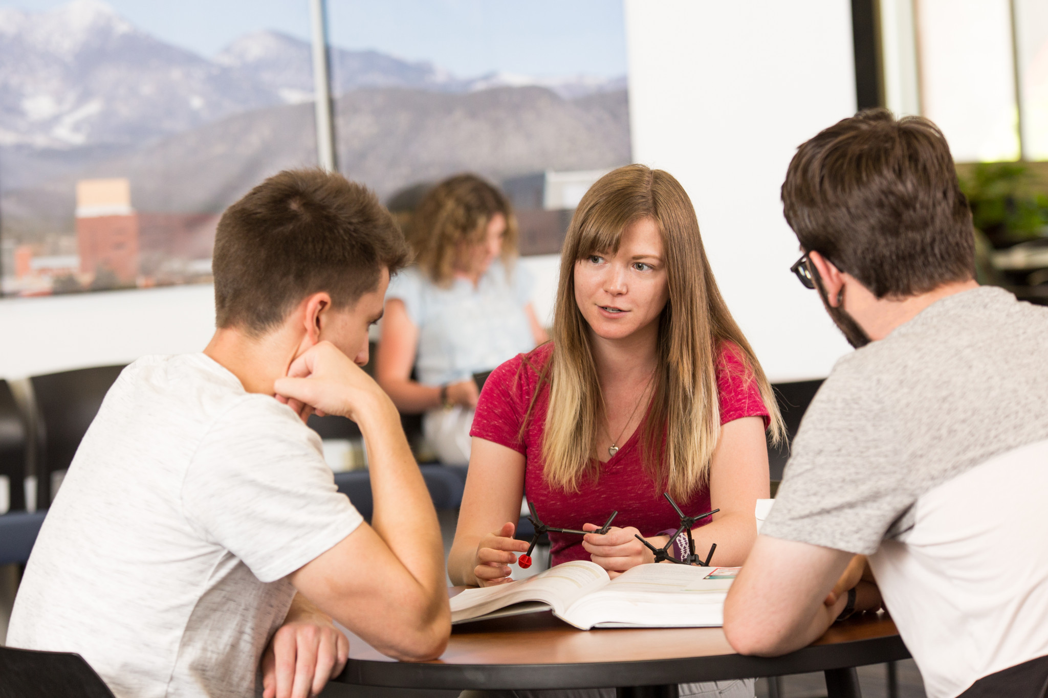 Students getting assistance on homework.