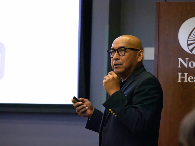 Del Yazzie speaks to the workshop attendees while presenting