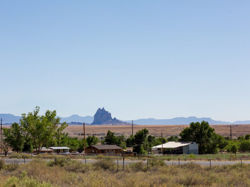 Houses and Shiprock located in Shiprock, New Mexico.