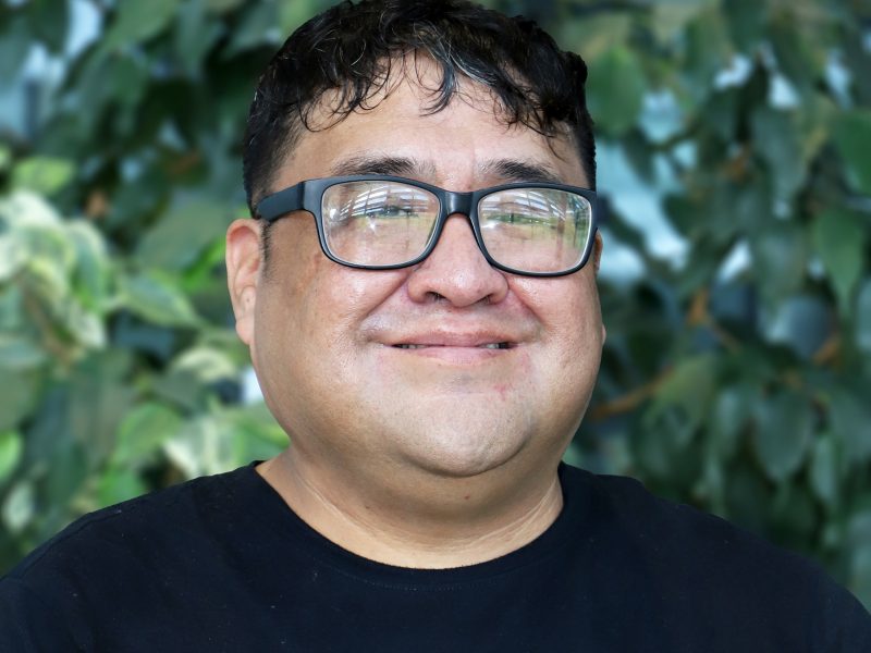 Headshot of Eli Bigthumb.