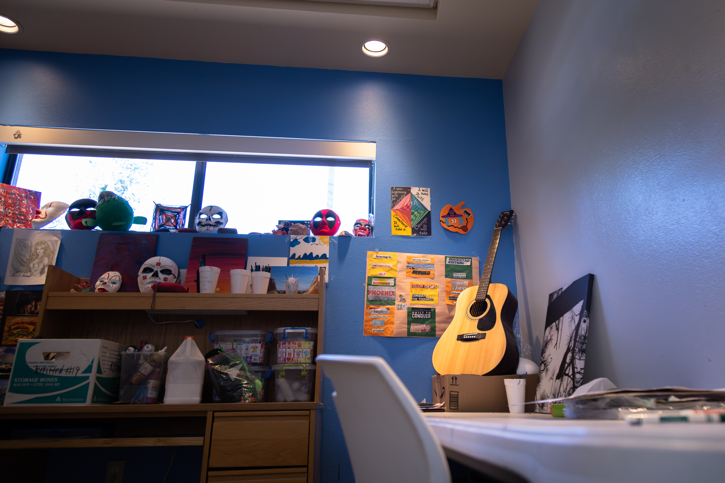 A guitar in a room.