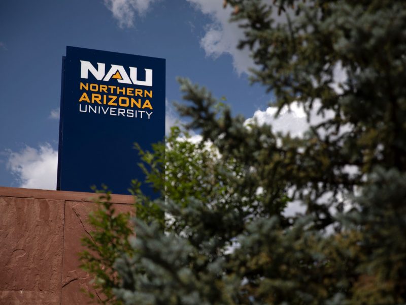 Official logo on an outside sign at NAU.