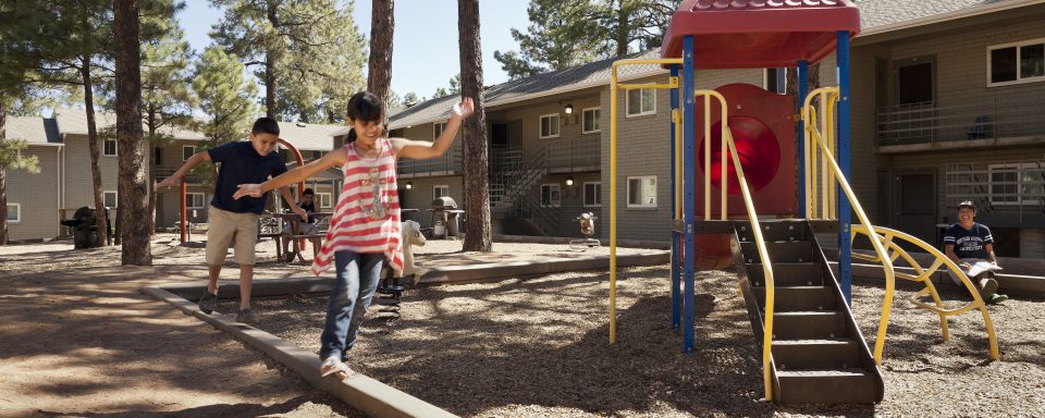 southvillage-exterior-children-playing-at-playground