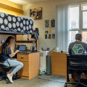 allen female traditional room with two students hanging out