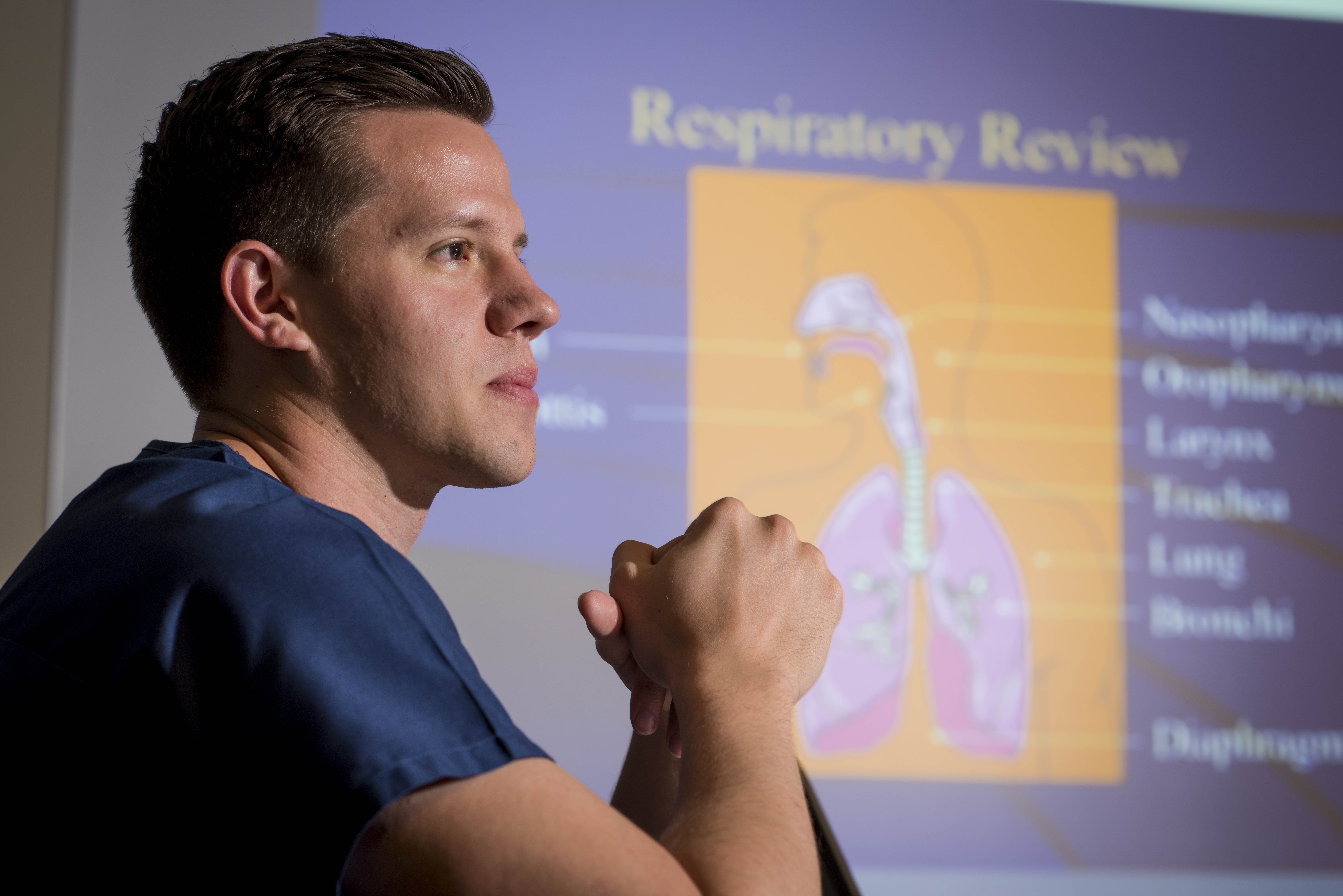 Nursing student working on presentation.