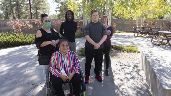 IHD staff member Sakénya McDonald meeting with students Leyevsca Santos Espinoza and Jacob Alexander (and their mothers/guardians) for their monthly coaching sessions at Coconino Community College