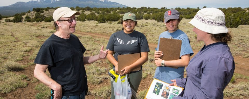 instructor and students discussing ecology