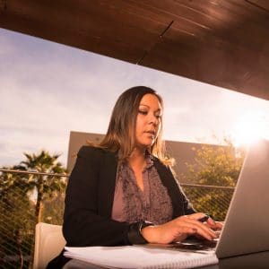 Online student is working on her laptop.