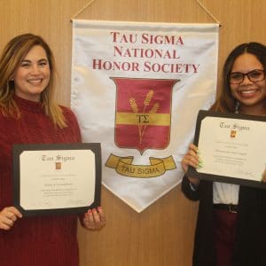 Two new Tau Sigma inductees with certificate