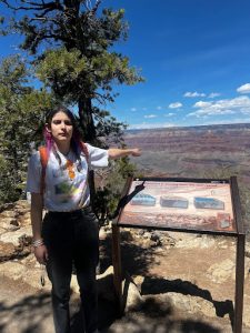 Dom pointing at the Grand Canyon