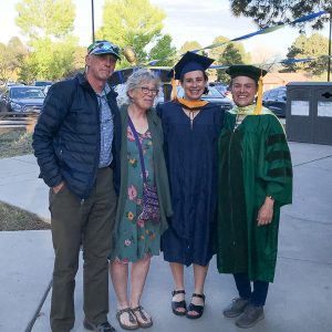 Caroline at her hooding ceremony. From left: Caroline’s parents (Cathy and Chris Mende), Caroline, and Caroline’s advisor Dr. Melissa Liebert.