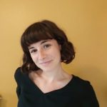 A photo of Caroline Mende, who has dark short brown hair with bangs, against a yellow background.
