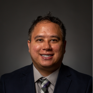 A headshot of Matt Roach