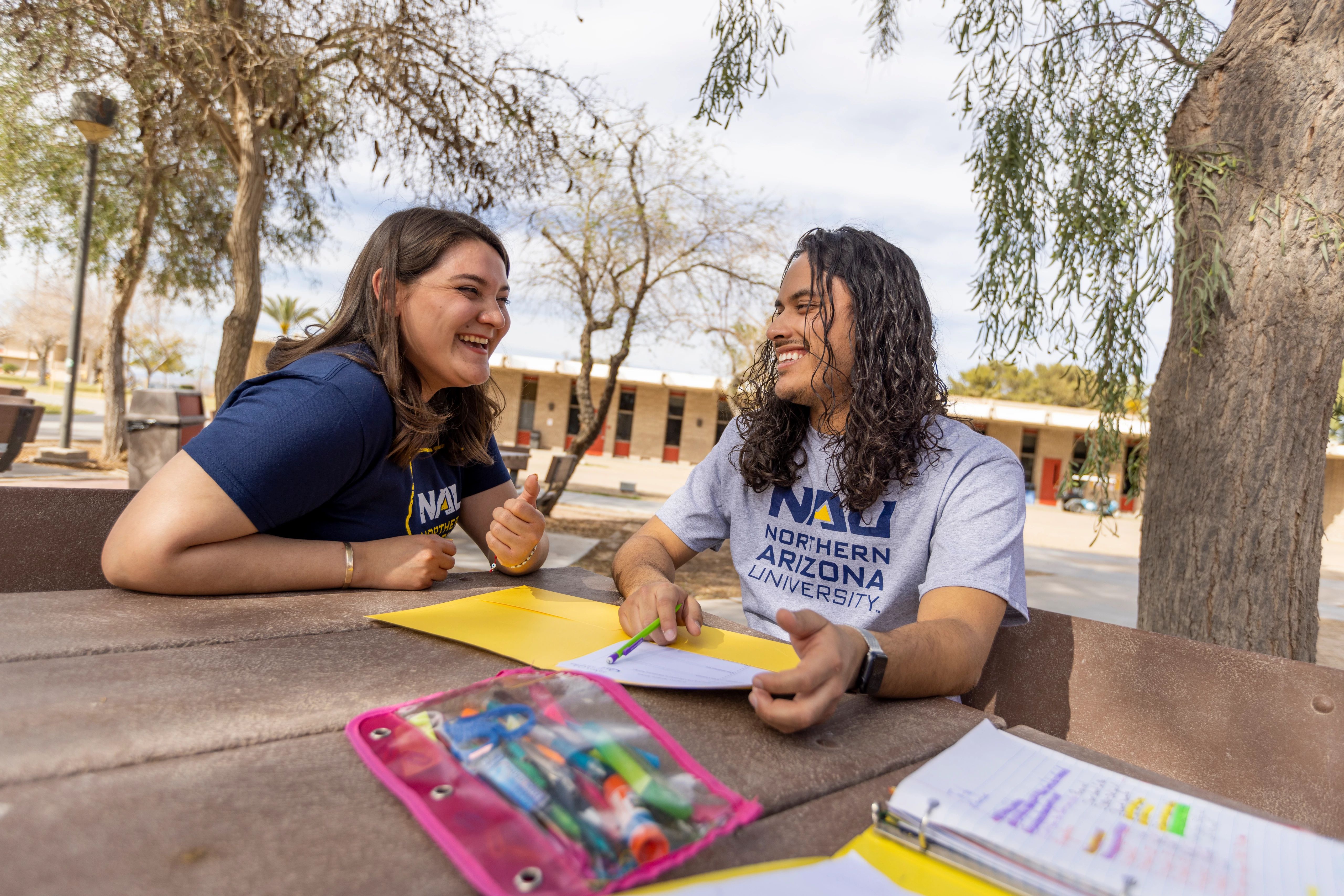 Students working together on the N A U–Yuma campus.