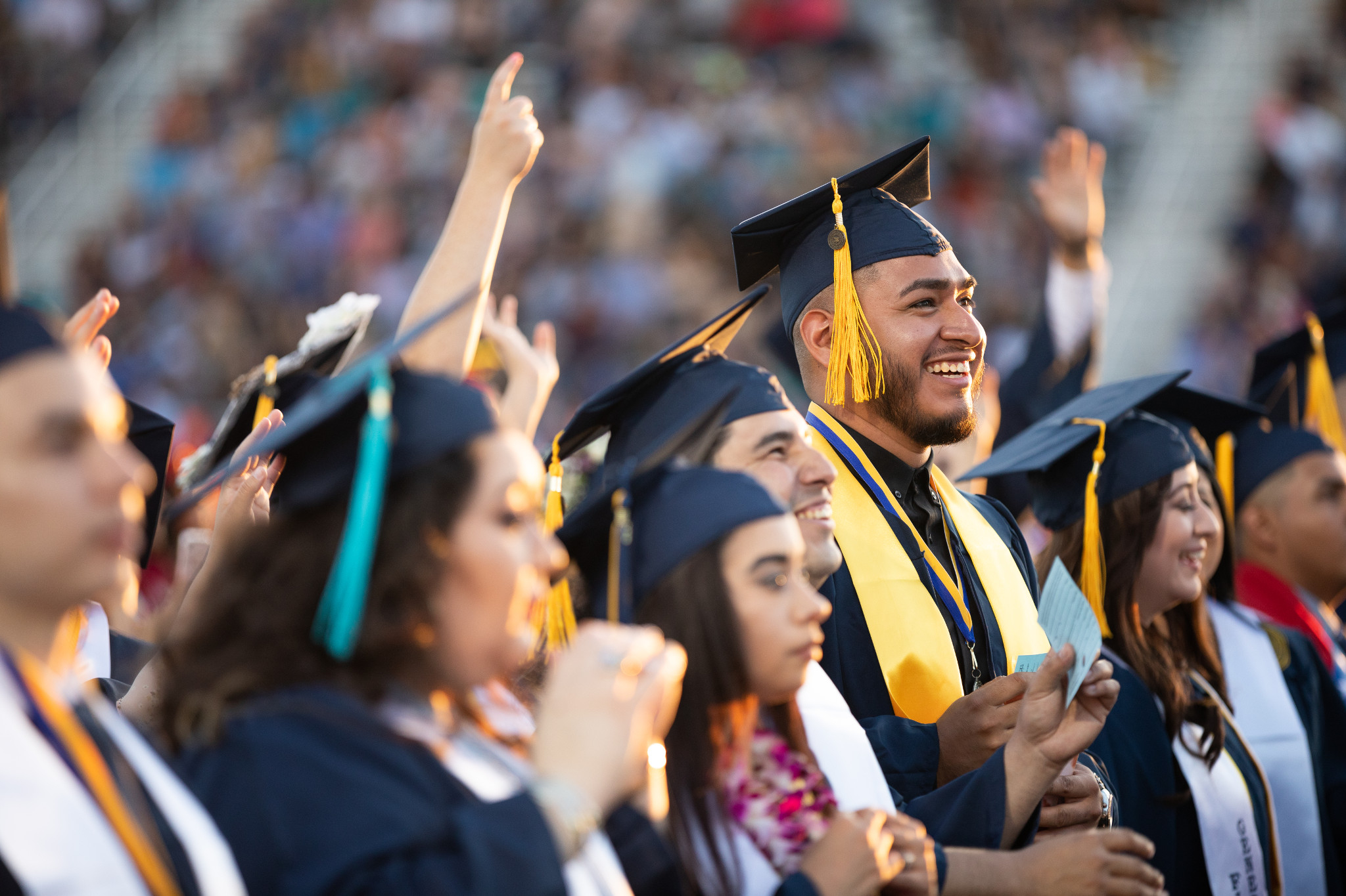Students at N A U–Yuma's commencement.