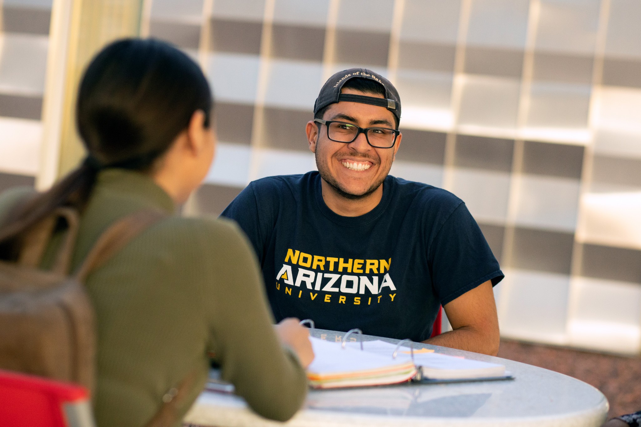 Student smiling at the N A U–Yuma campus.