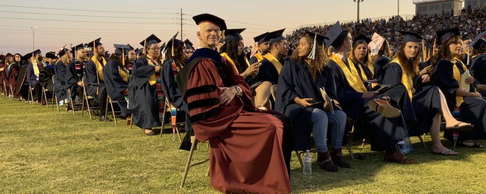 Dr. Chris Gore at NAU students' graduation